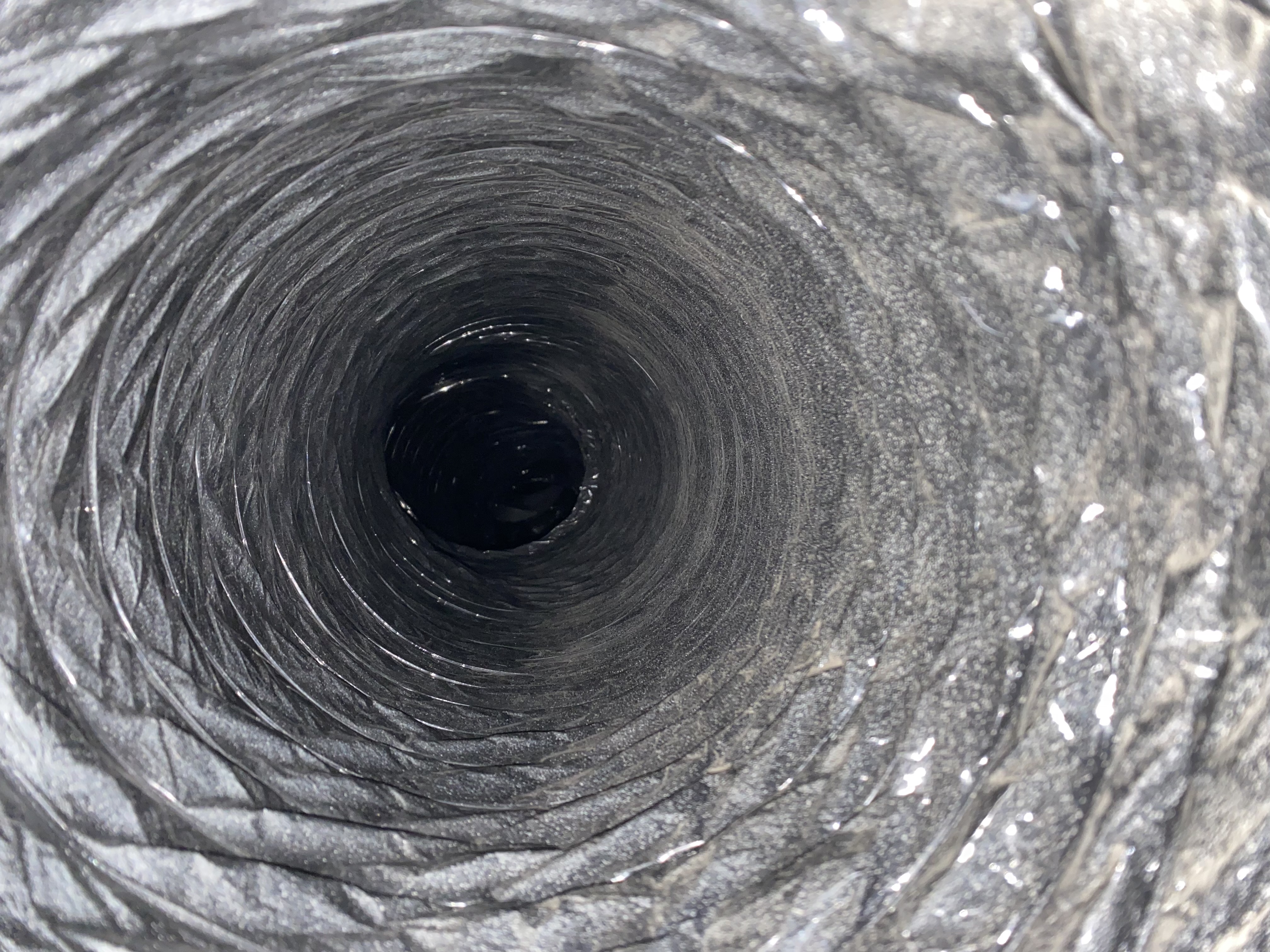 Inside view of a clean flexible air duct after State 48 cleaning